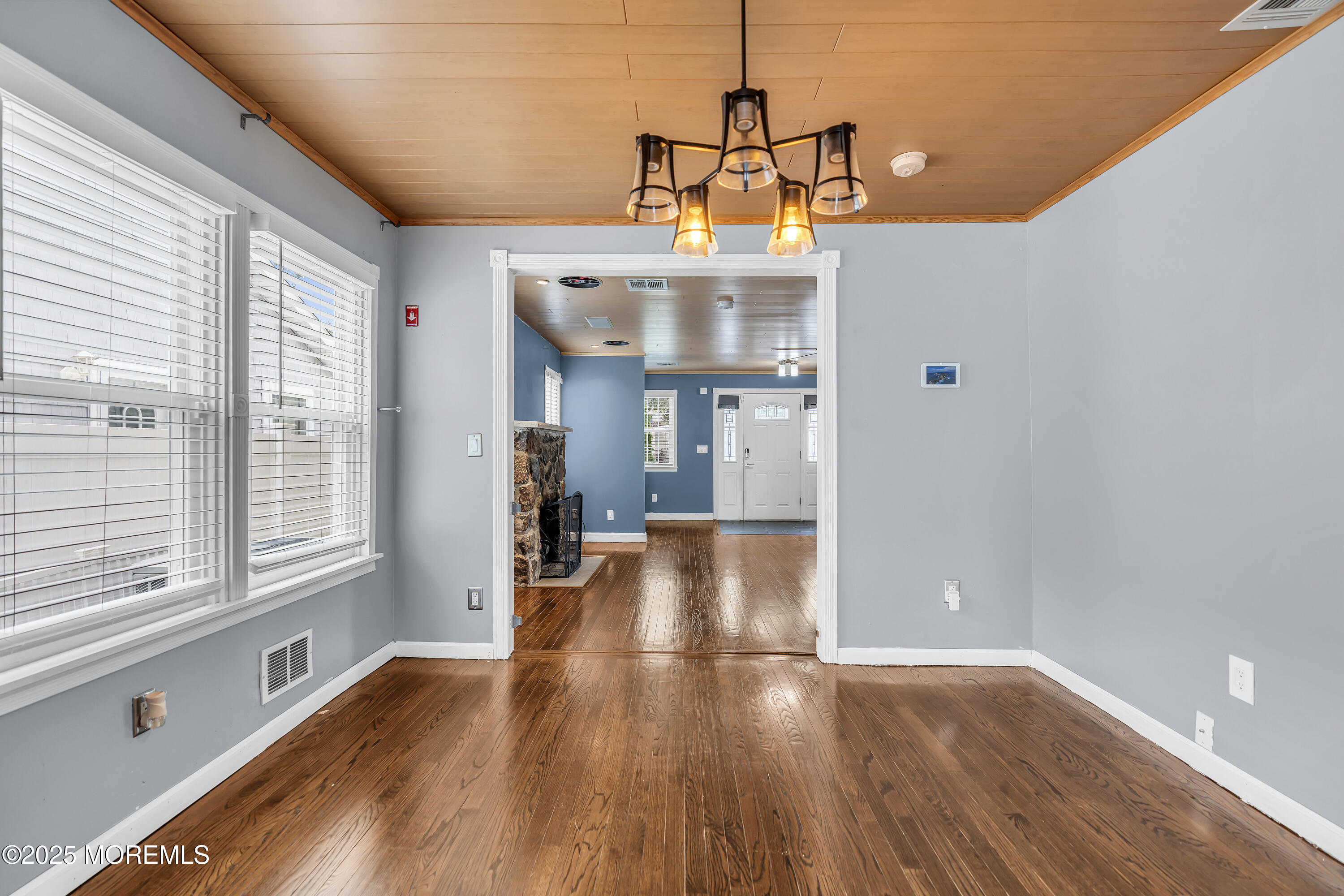 111 Breton Road Brick, NJ 08723 - Photo 7 of 59 a view of a room with wooden floor and windows