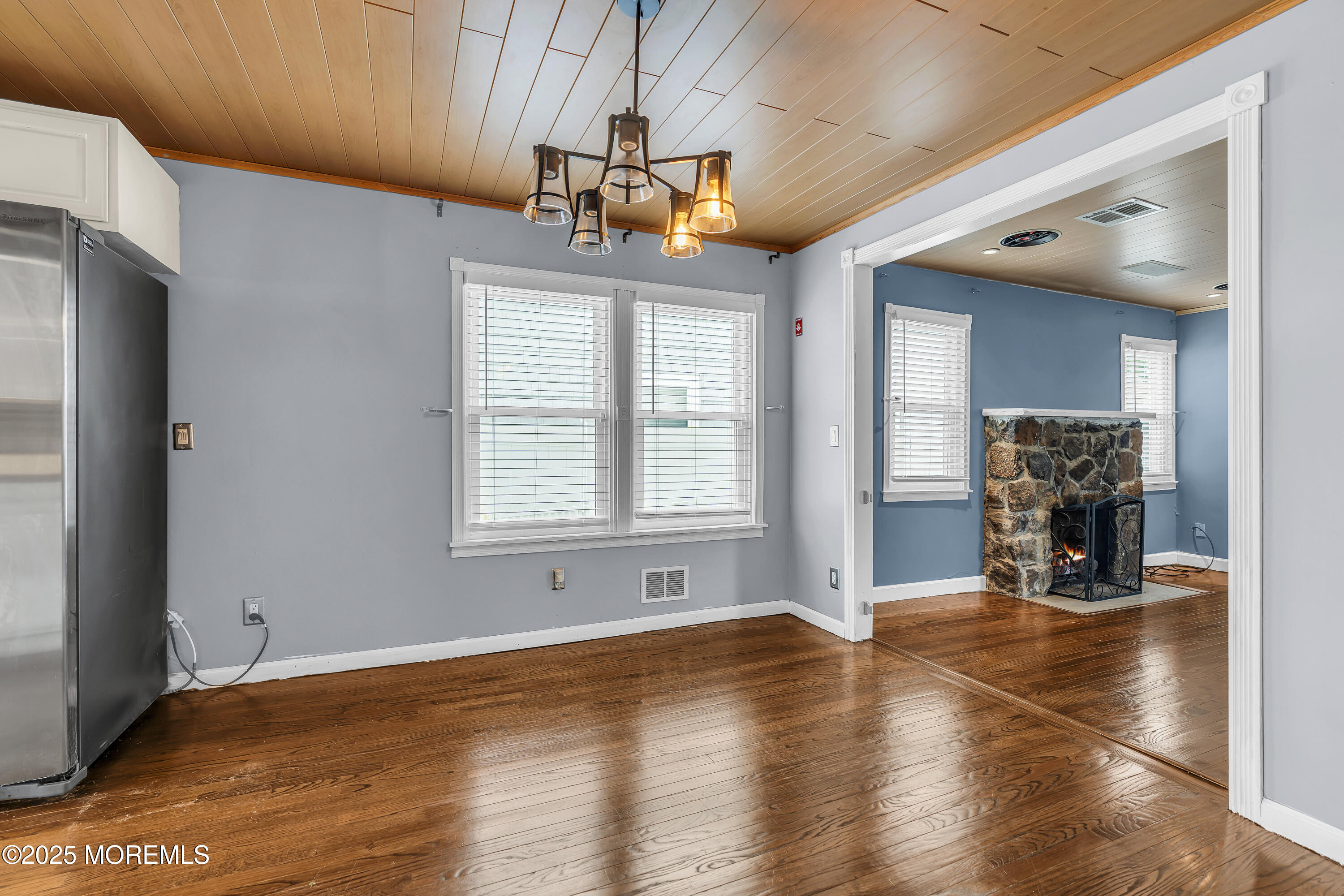 111 Breton Road Brick, NJ 08723 - Photo 8 of 59 a view of livingroom with hardwood floor and a ceiling fan