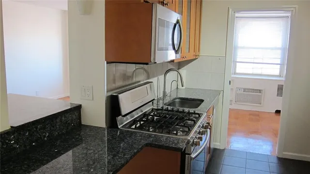 a bathroom with a sink and mirror