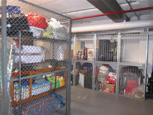 a view of roof with city view