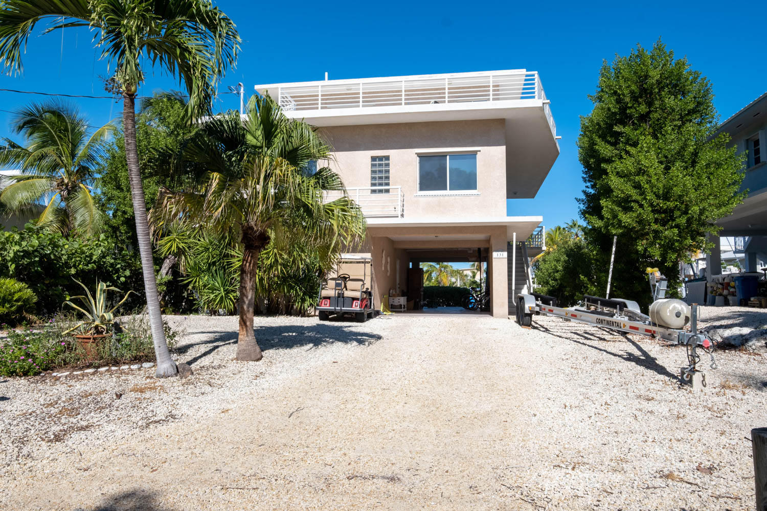 131 Stinger Road Tavernier, FL 33070 - Photo 27 of 37 Storage enclosure and carport