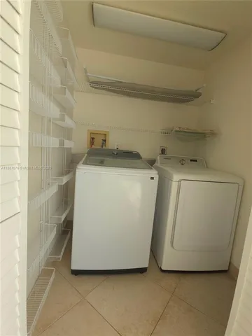 a utility room with a washer and dryer