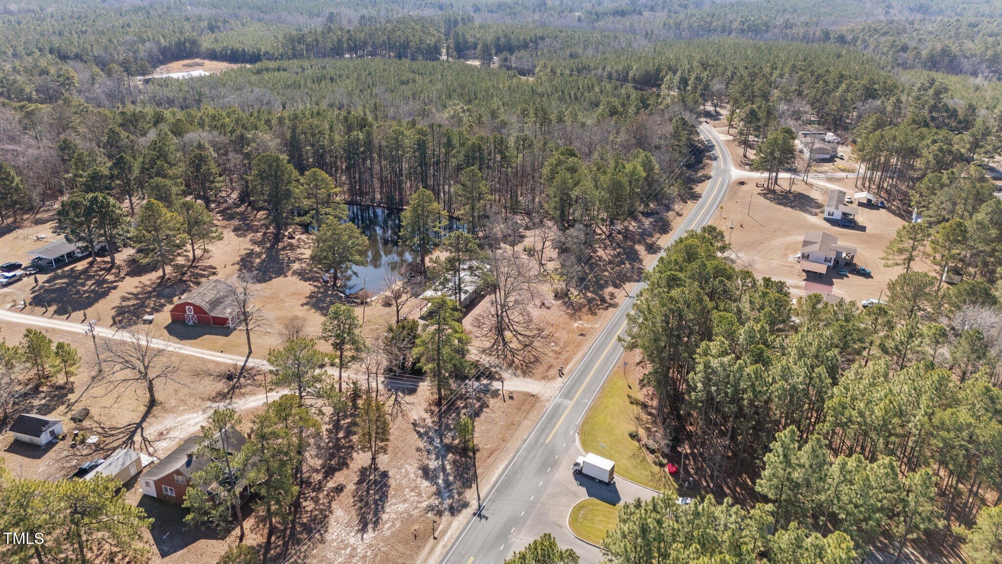 2630 Ponderosa Road Cameron, NC 28326 - Photo 18 of 26 a view of a houses with a yard
