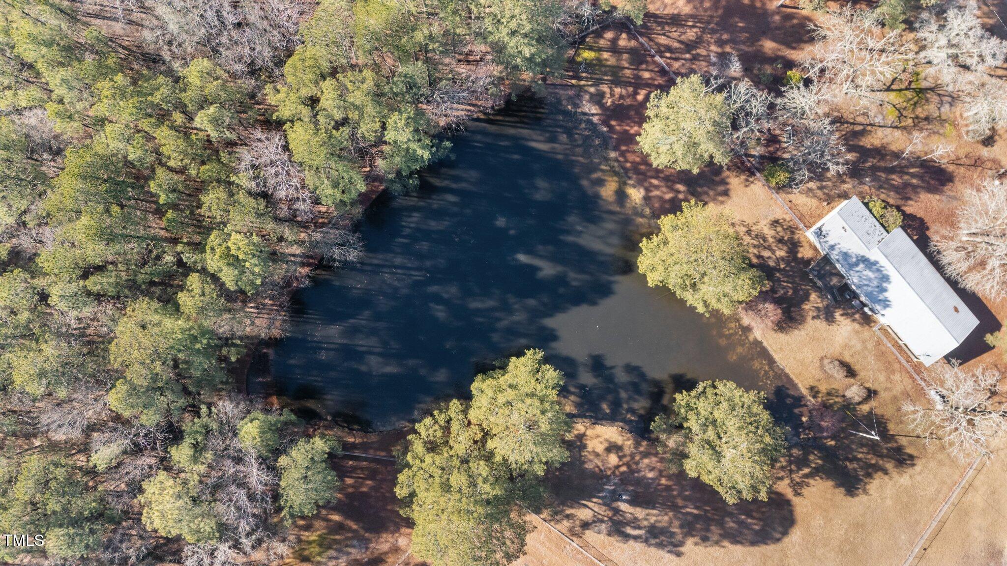2630 Ponderosa Road Cameron, NC 28326 - Photo 9 of 26 a view of a yard with a flower plant