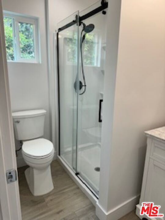 620 25th Street Manhattan Beach, CA 90266 - Photo 17 of 51 a bathroom with a toilet and a shower