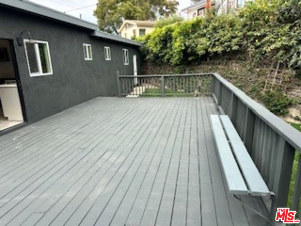 620 25th Street Manhattan Beach, CA 90266 - Photo 31 of 51 a balcony with trees in front of it