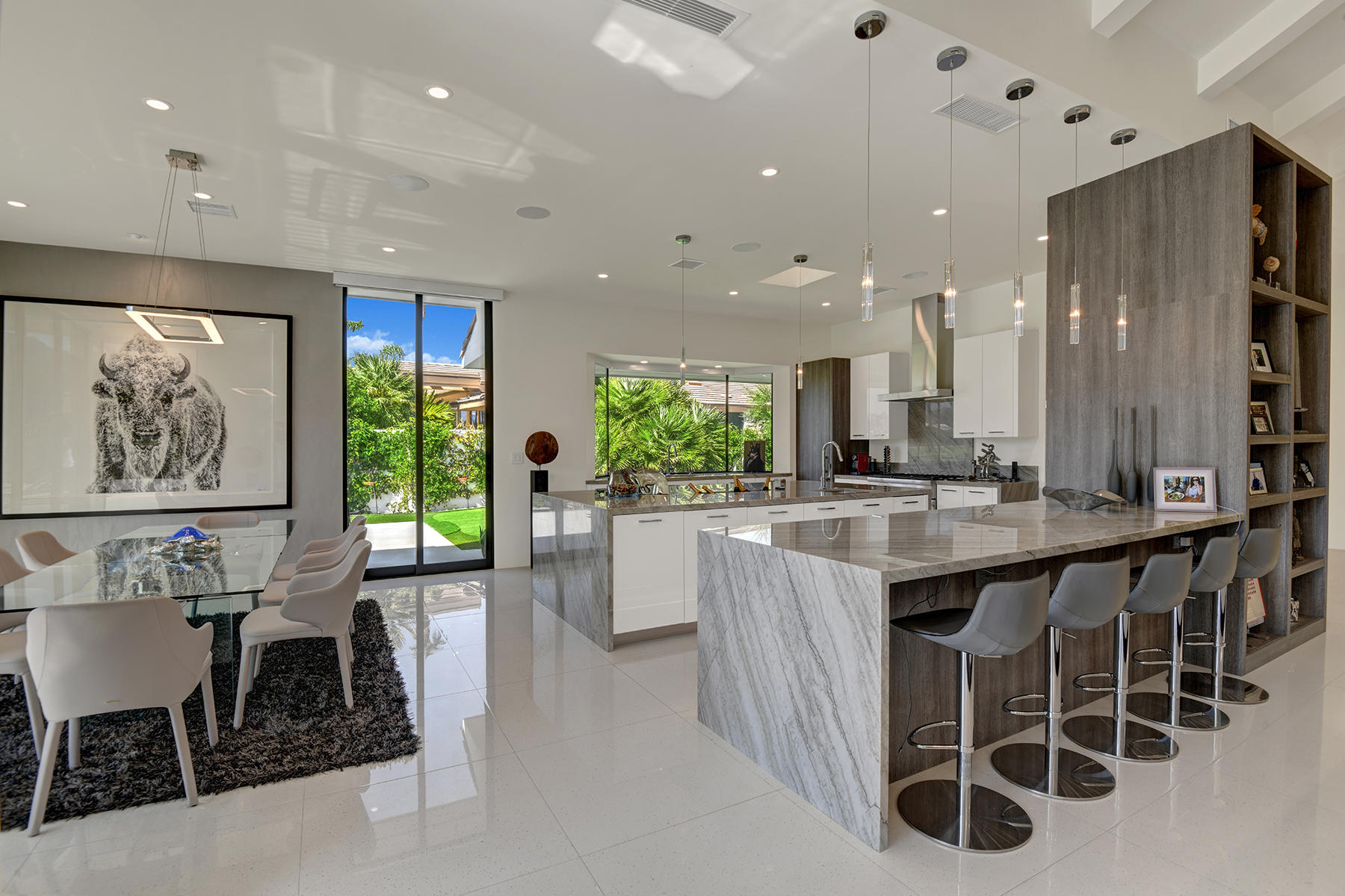 4 Deerfield Court Rancho Mirage, CA 92270 - Photo 13 of 53 a kitchen with kitchen island granite countertop lots of counter top space and stainless steel appliances