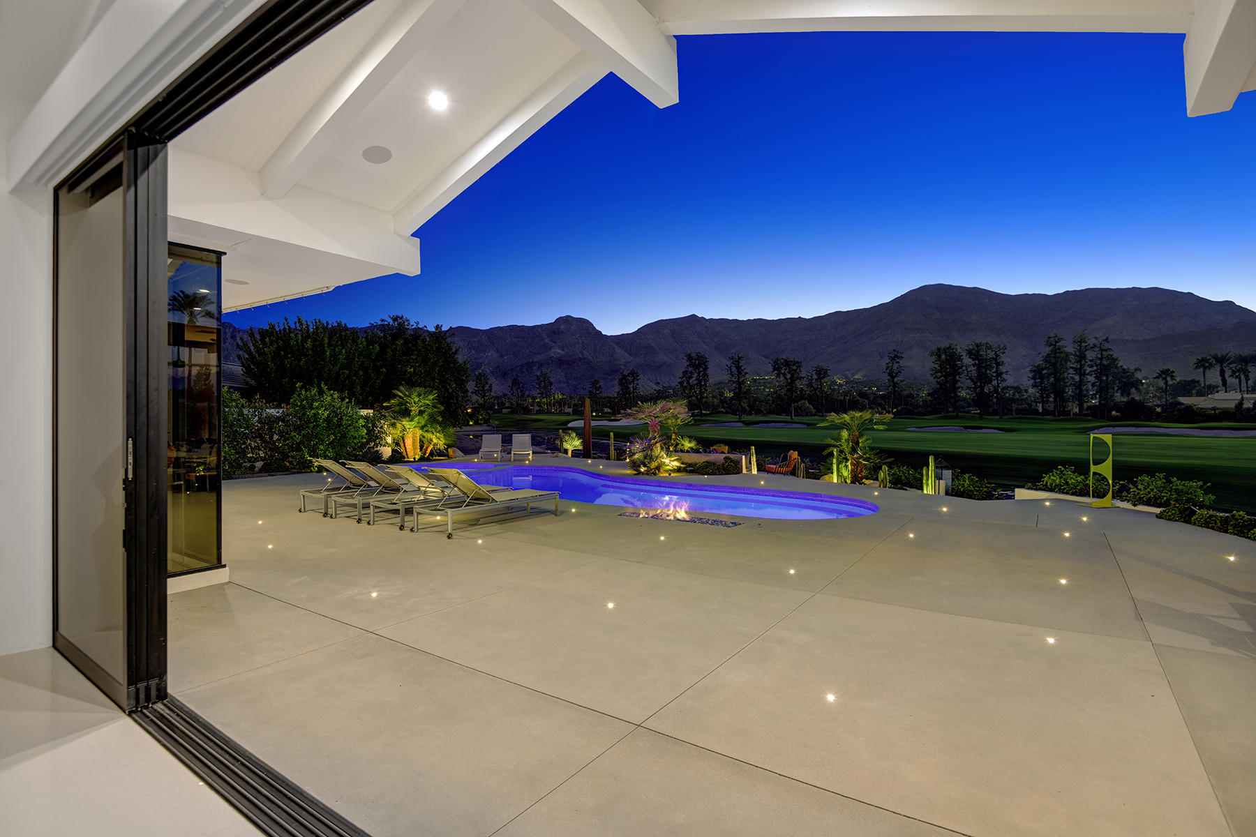 4 Deerfield Court Rancho Mirage, CA 92270 - Photo 2 of 53 a view of swimming pool with a patio