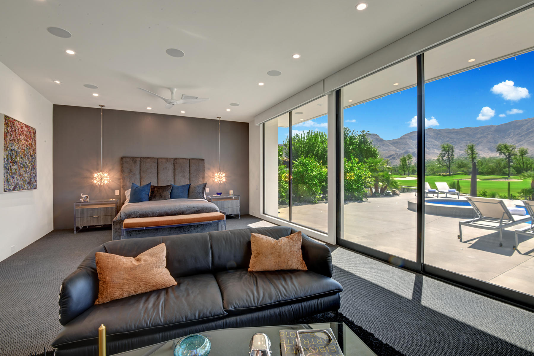 4 Deerfield Court Rancho Mirage, CA 92270 - Photo 25 of 53 a bedroom with furniture and large windows