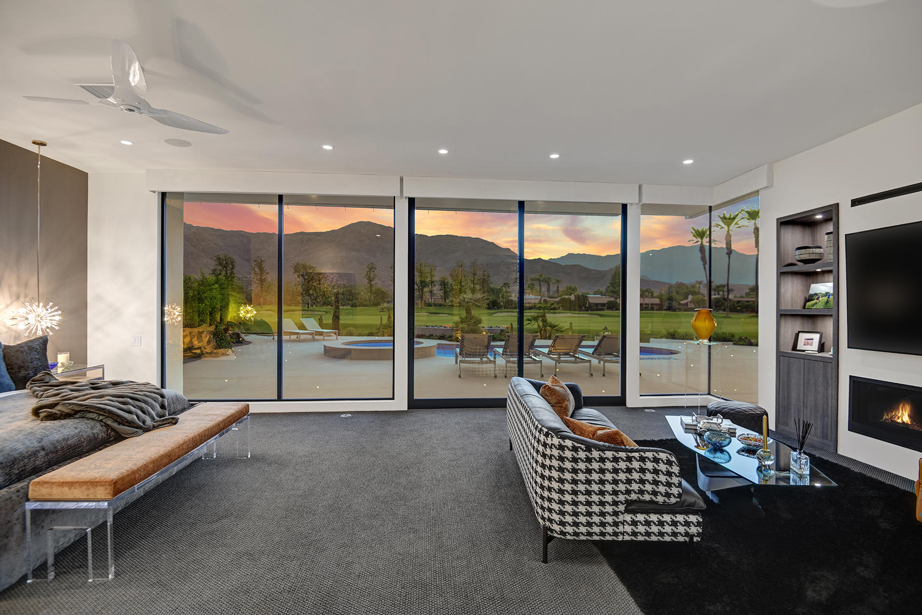 4 Deerfield Court Rancho Mirage, CA 92270 - Photo 27 of 53 a room with furniture and large windows