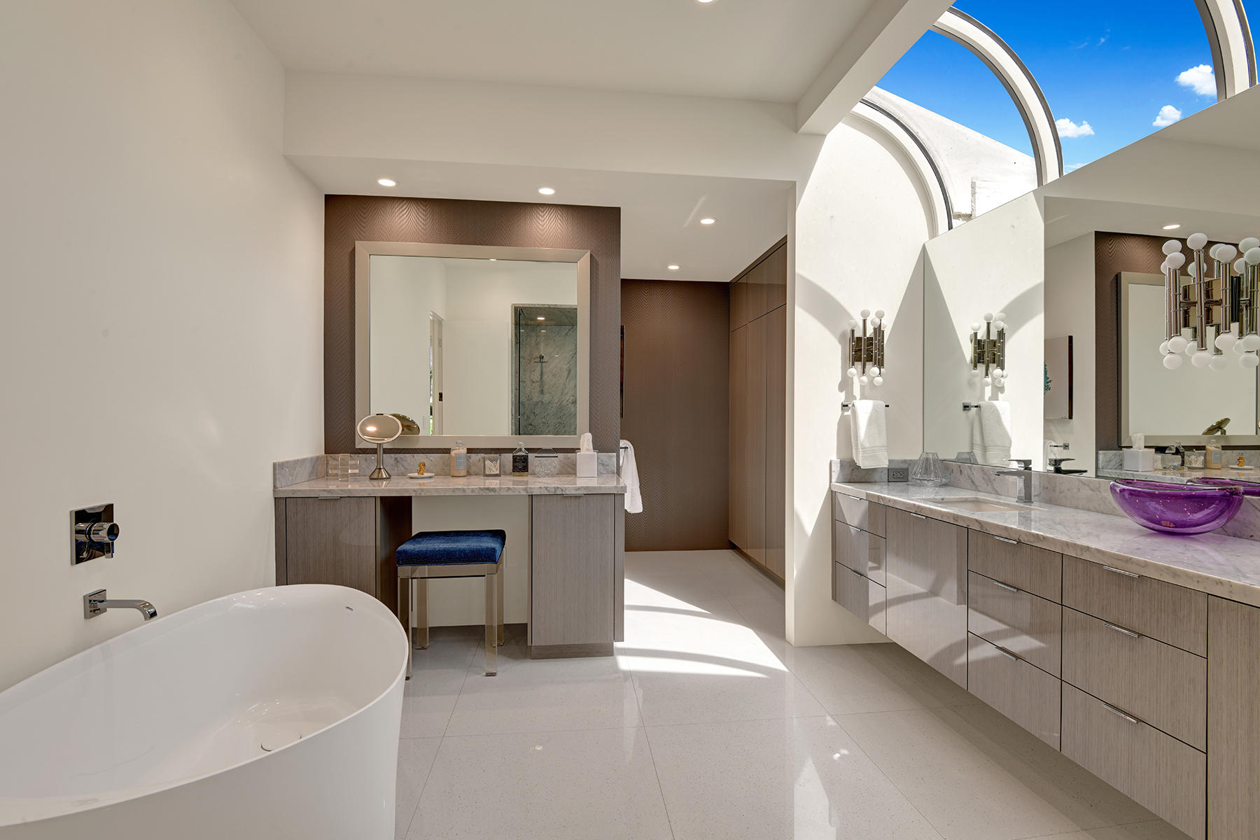 4 Deerfield Court Rancho Mirage, CA 92270 - Photo 28 of 53 a bathroom with a tub sink and mirror