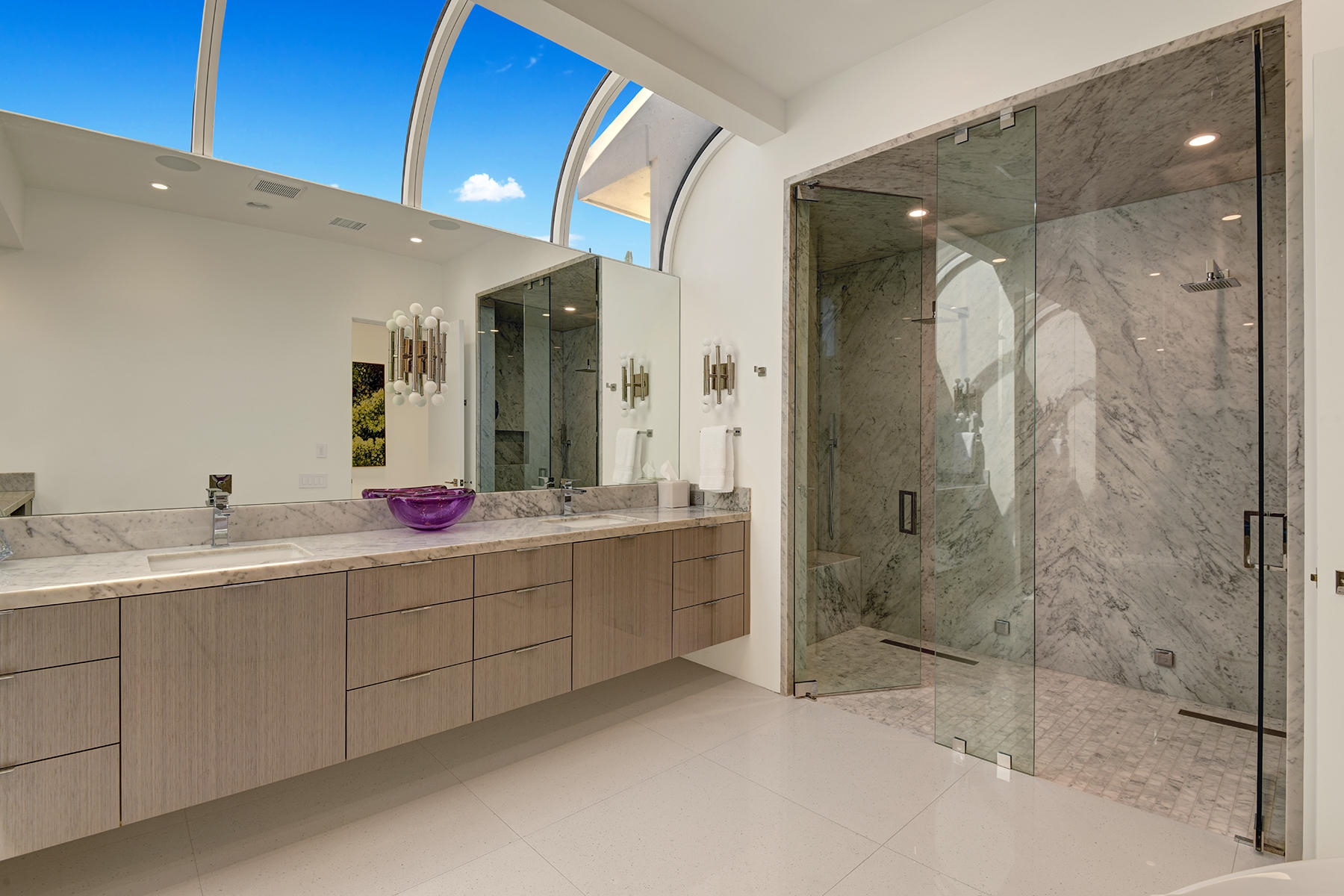 4 Deerfield Court Rancho Mirage, CA 92270 - Photo 29 of 53 a bathroom with a double vanity sink mirror and shower