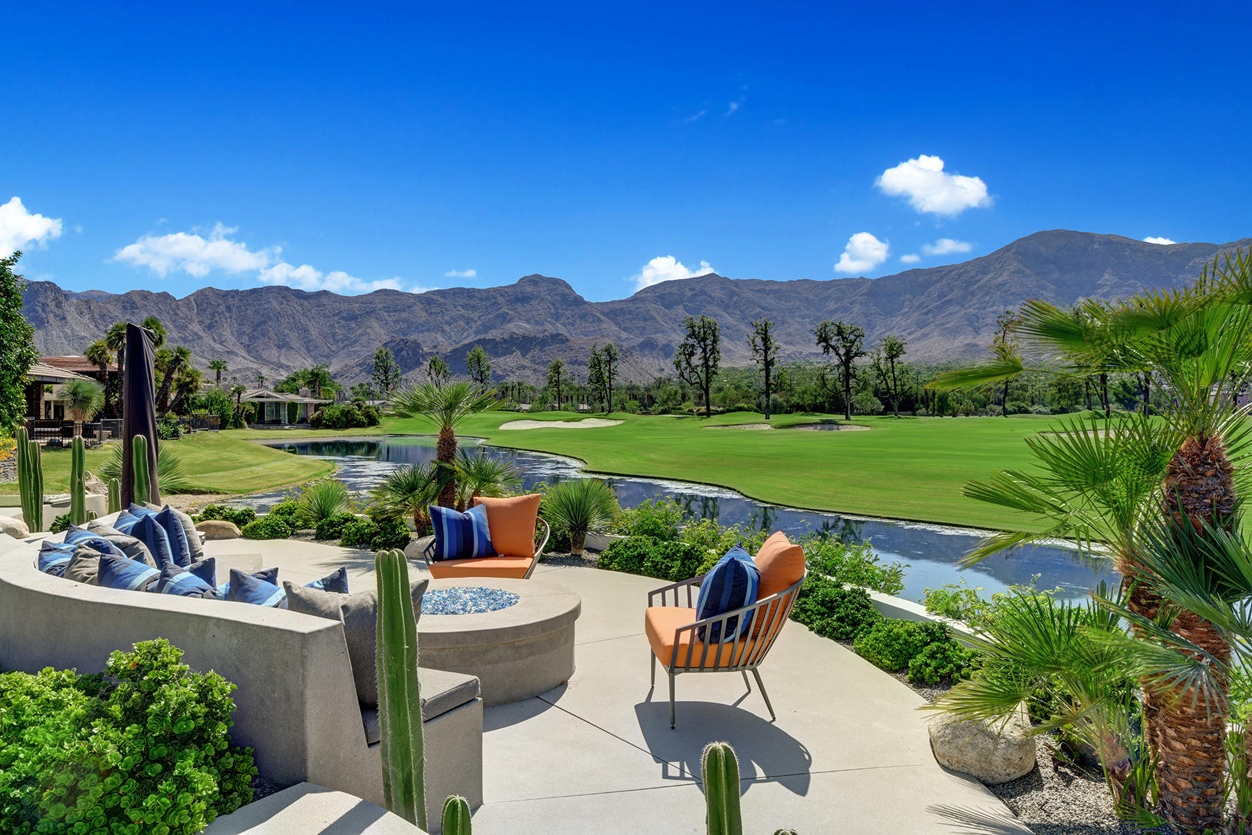 4 Deerfield Court Rancho Mirage, CA 92270 - Photo 3 of 53 a view of a fountain with a patio