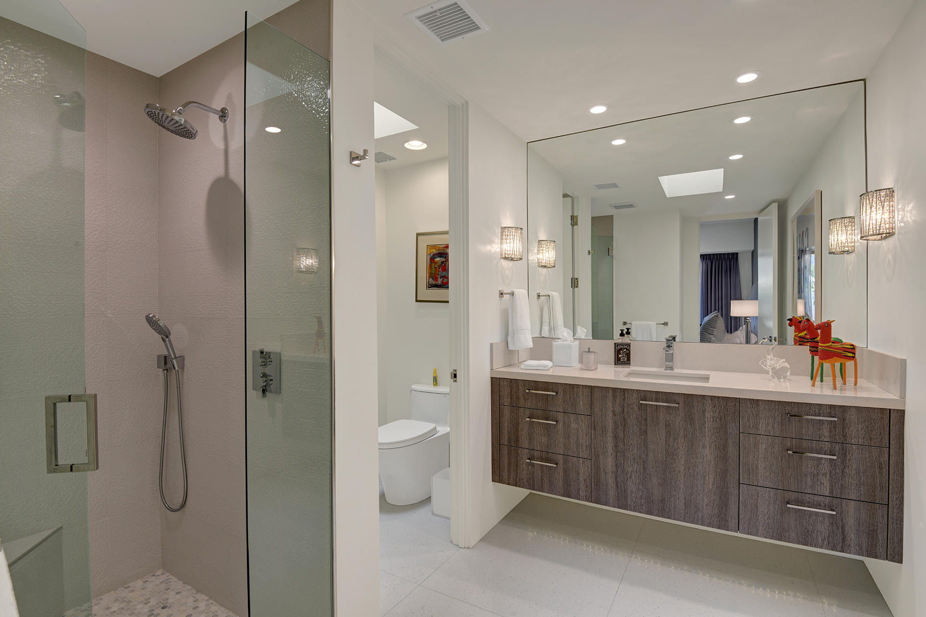 4 Deerfield Court Rancho Mirage, CA 92270 - Photo 38 of 53 a bathroom with a double vanity sink mirror and toilet