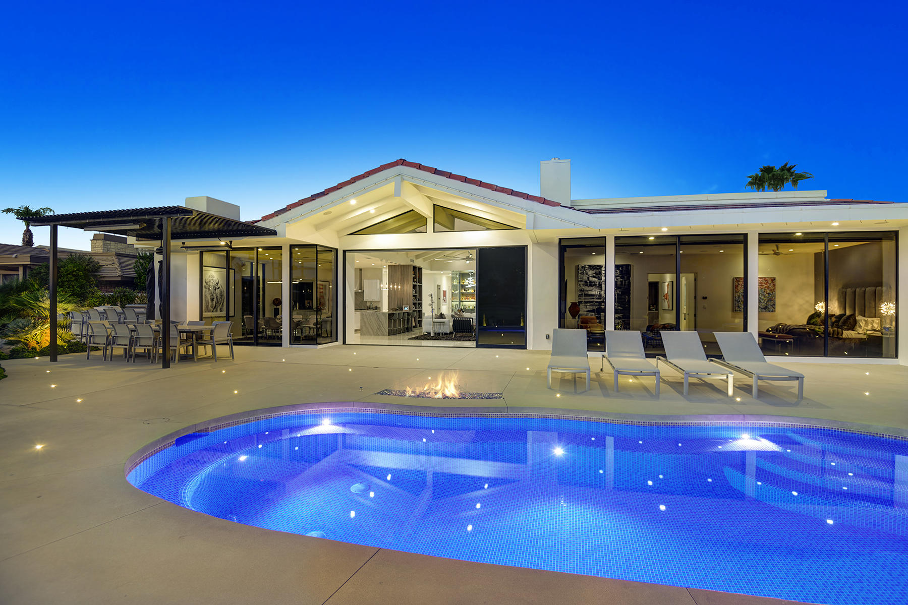 4 Deerfield Court Rancho Mirage, CA 92270 - Photo 44 of 53 a view of a house with a swimming pool