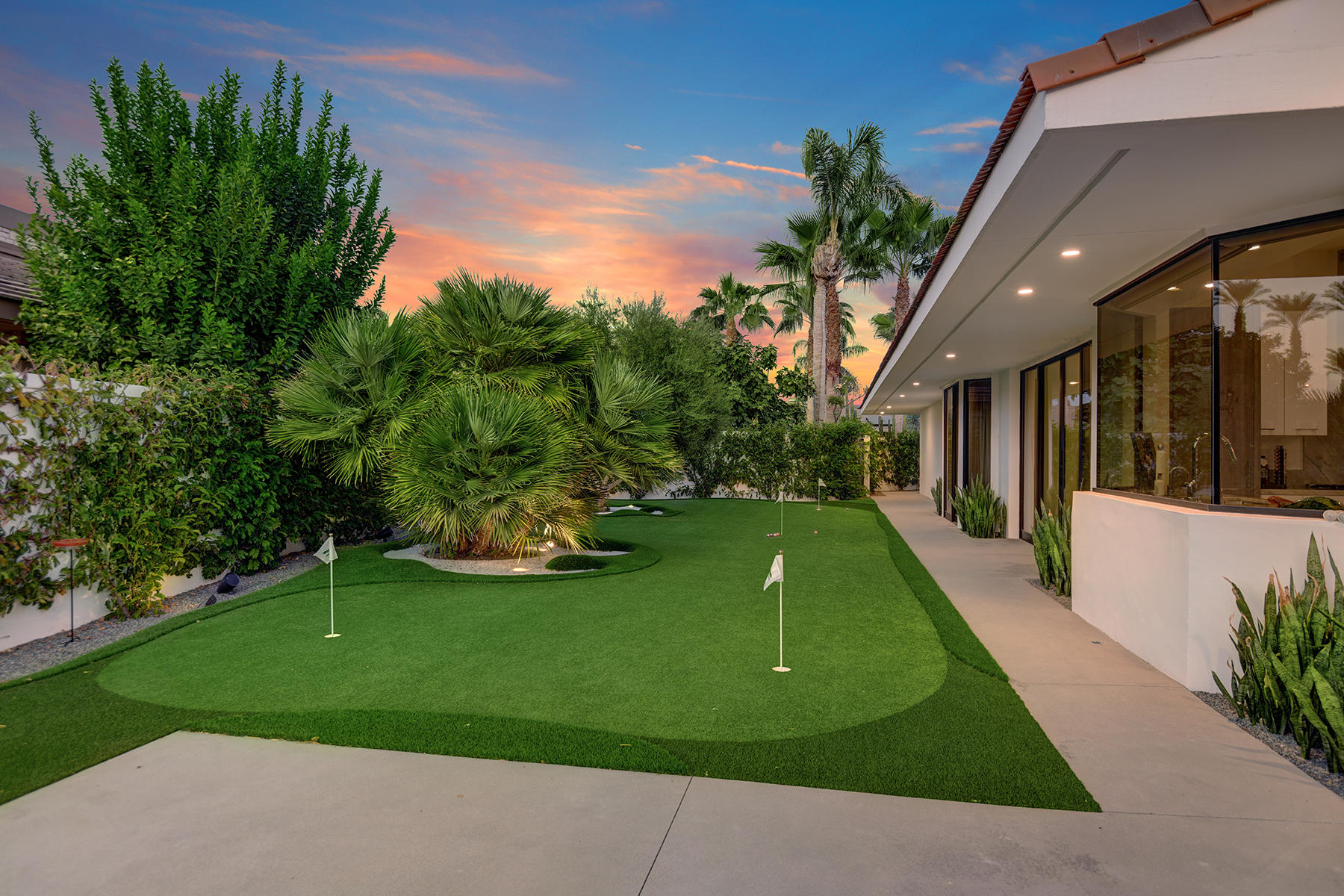 4 Deerfield Court Rancho Mirage, CA 92270 - Photo 47 of 53 a view of a house with a backyard