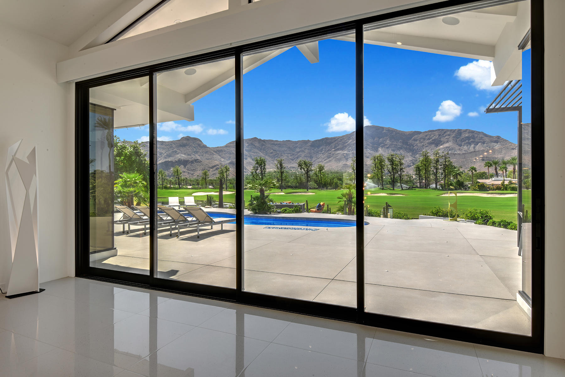 4 Deerfield Court Rancho Mirage, CA 92270 - Photo 6 of 53 a view of a room with a large window