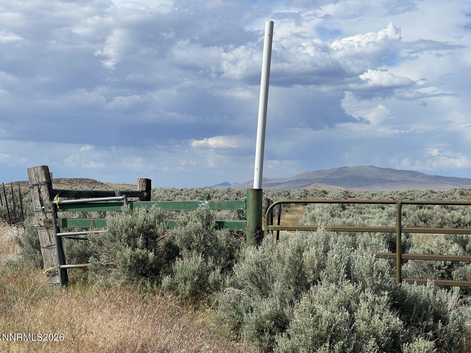 10 Button Point Road Golconda, NV 89414 - Photo 3 of 25 a view of a garden with a bench