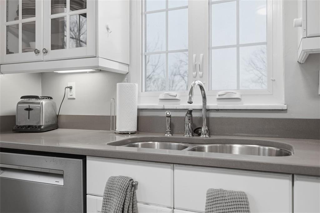 111 Rockingham Road Pittsburgh, PA 15238 - Photo 16 of 38 a kitchen with a sink and cabinets