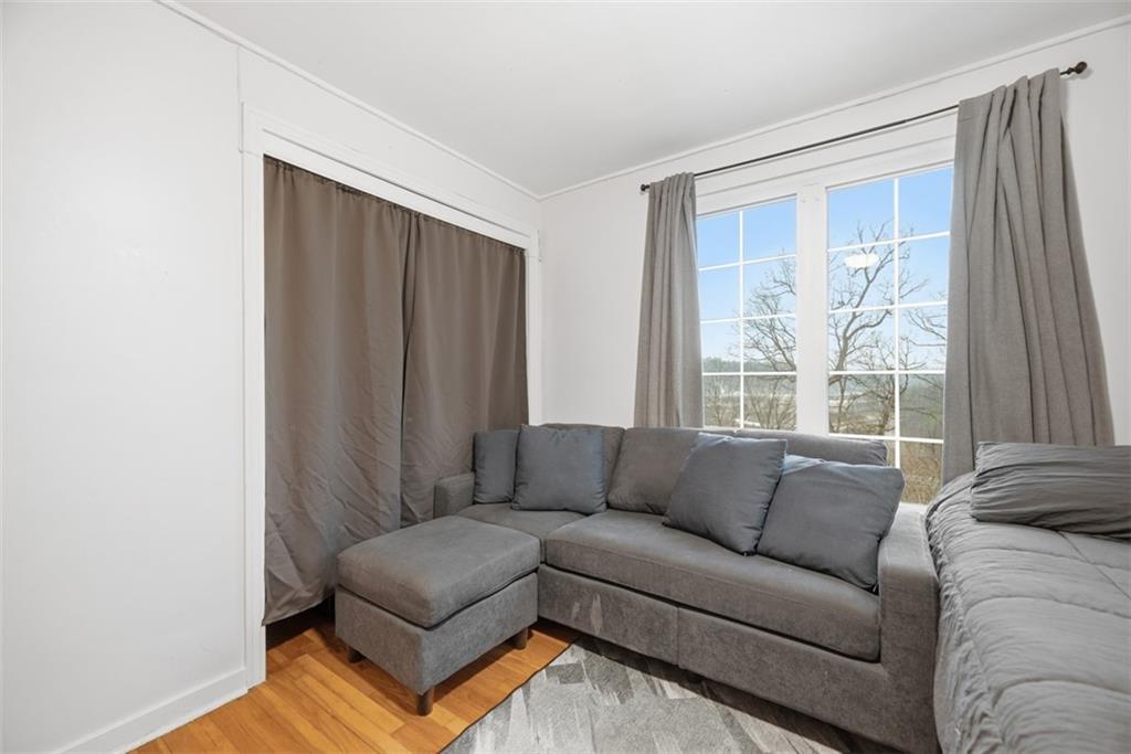111 Rockingham Road Pittsburgh, PA 15238 - Photo 20 of 38 a living room with furniture and a window