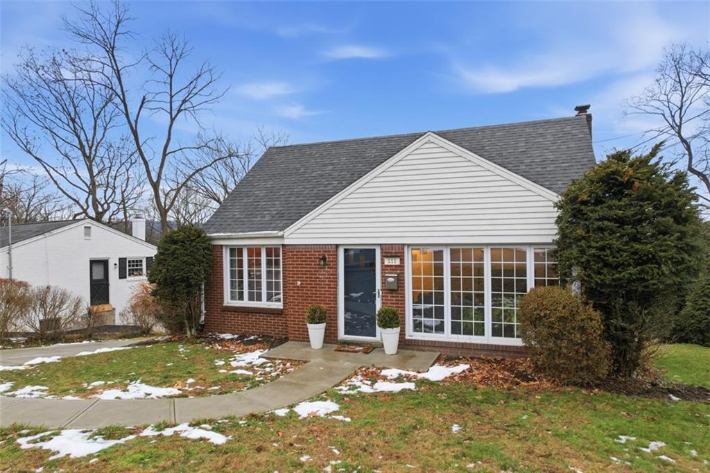 111 Rockingham Road Pittsburgh, PA 15238 - Photo 2 of 38 a front view of a house with a yard