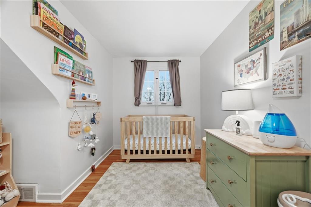111 Rockingham Road Pittsburgh, PA 15238 - Photo 22 of 38 a bedroom with furniture and a window