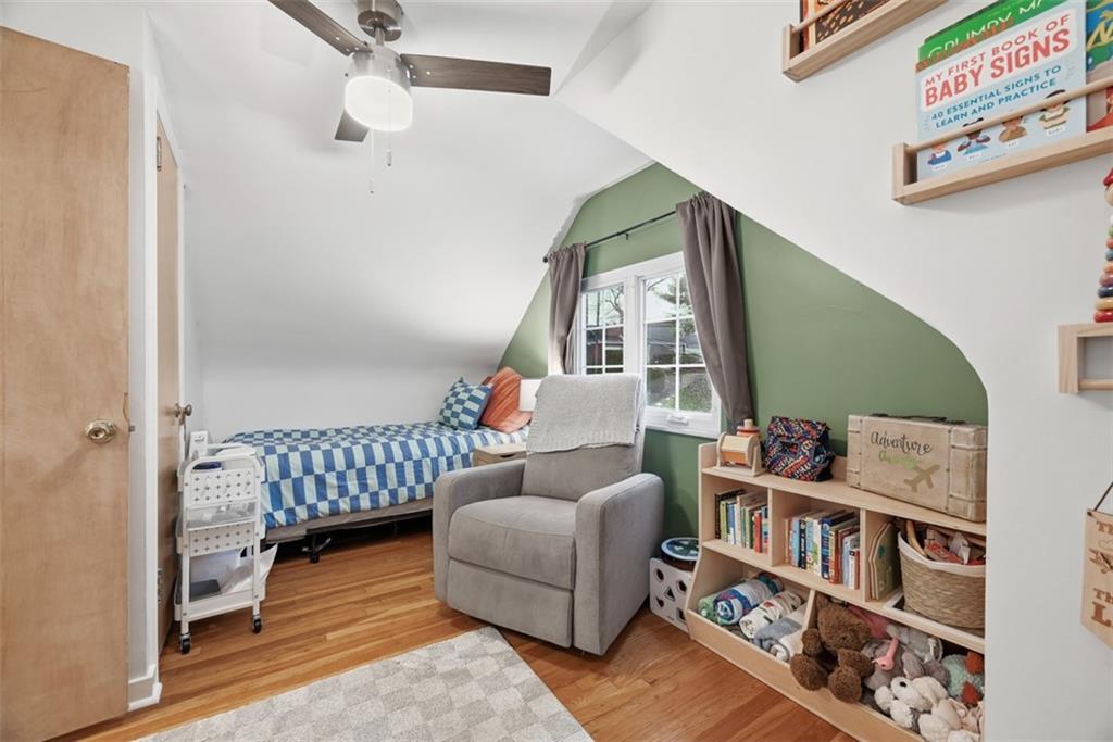 111 Rockingham Road Pittsburgh, PA 15238 - Photo 23 of 38 a bedroom with furniture and a book shelf