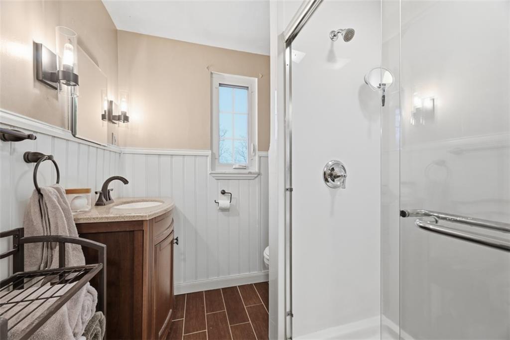 111 Rockingham Road Pittsburgh, PA 15238 - Photo 24 of 38 a bathroom with a sink and a mirror