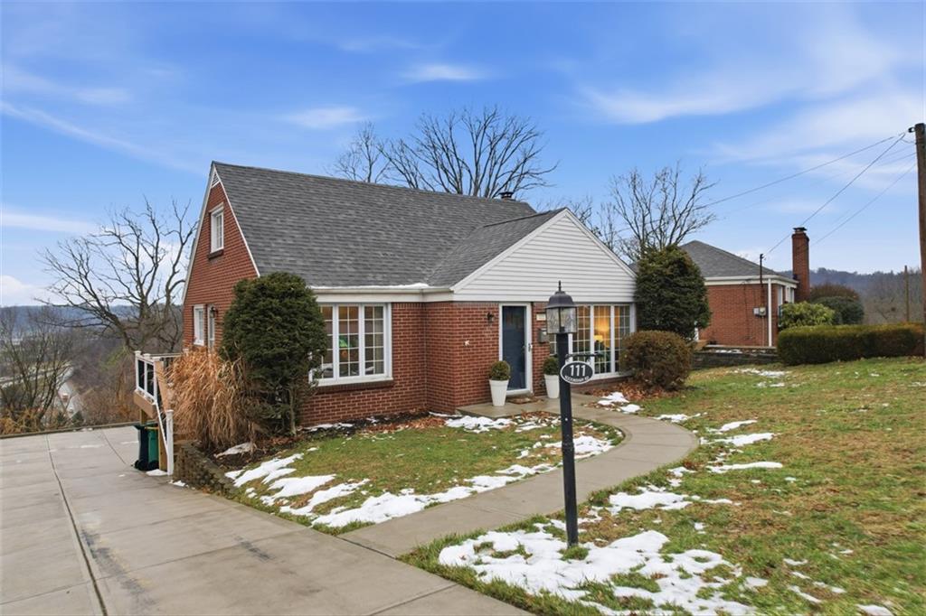 111 Rockingham Road Pittsburgh, PA 15238 - Photo 3 of 38 a front view of a house with garden