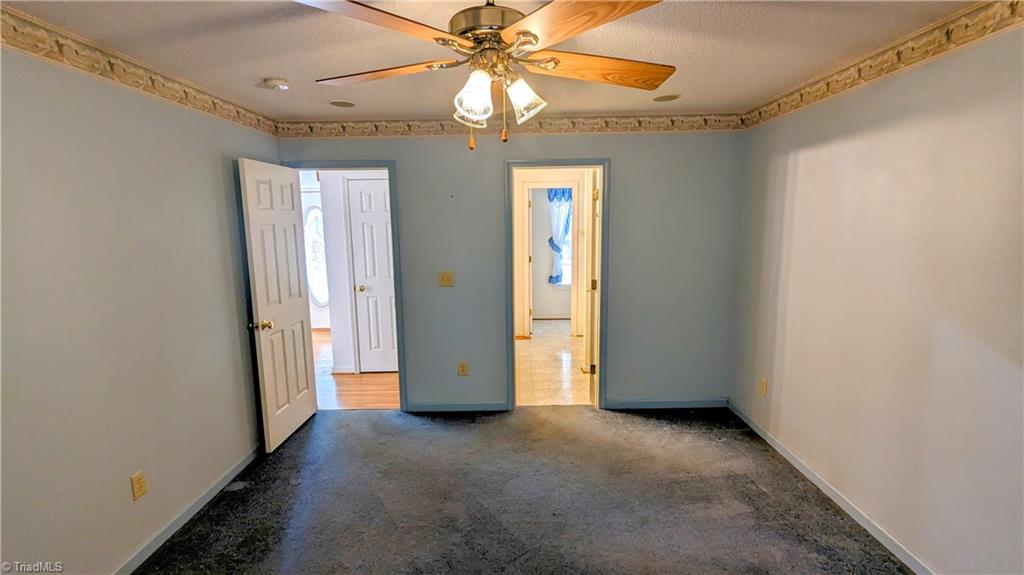 197 Sabins Estates Drive Rougemont, NC 27572 - Photo 29 of 50 Master bedroom with master bath in the back ground
