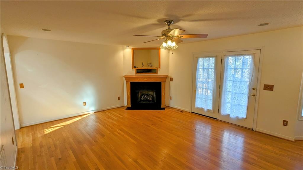 197 Sabins Estates Drive Rougemont, NC 27572 - Photo 38 of 50 Large Family Room and Fireplace with gas logs. TV sits over fireplace