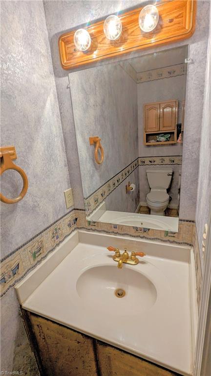 197 Sabins Estates Drive Rougemont, NC 27572 - Photo 41 of 50 Half bath as you come in from the garage