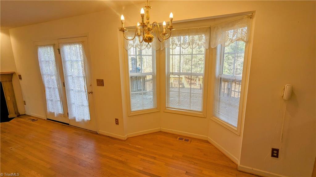 197 Sabins Estates Drive Rougemont, NC 27572 - Photo 44 of 50 Dining room with Bay window. Patio doors open to HUGE back deck