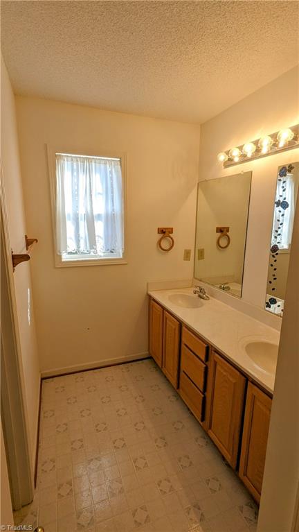 197 Sabins Estates Drive Rougemont, NC 27572 - Photo 9 of 50 Double vanity in upstairs bath