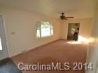 4438 Flowes Store Road Concord, NC 28025 - Photo 5 of 15 an empty room with windows