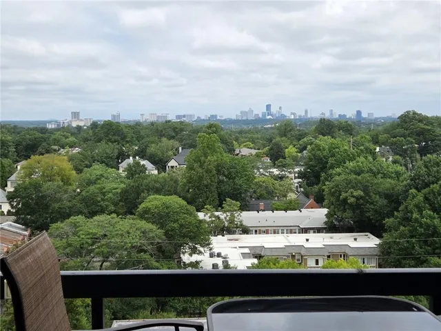 a view of staircase with a rug