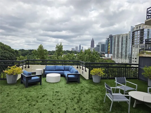 a view of gym equipment with floor to ceiling window
