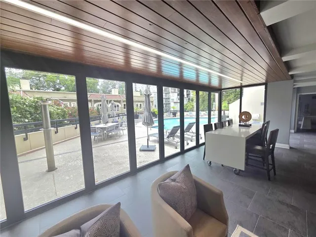 a living room with furniture and a table