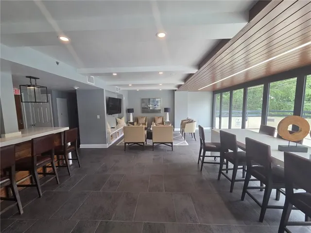 a view of a hallway with windows