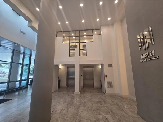 a view of a lake with a city