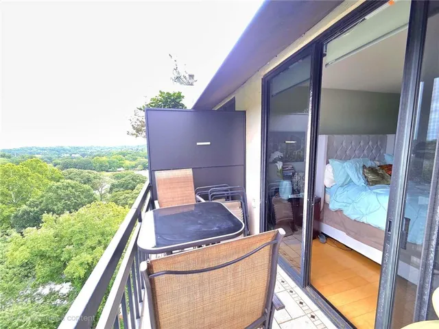 a balcony with an outdoor space