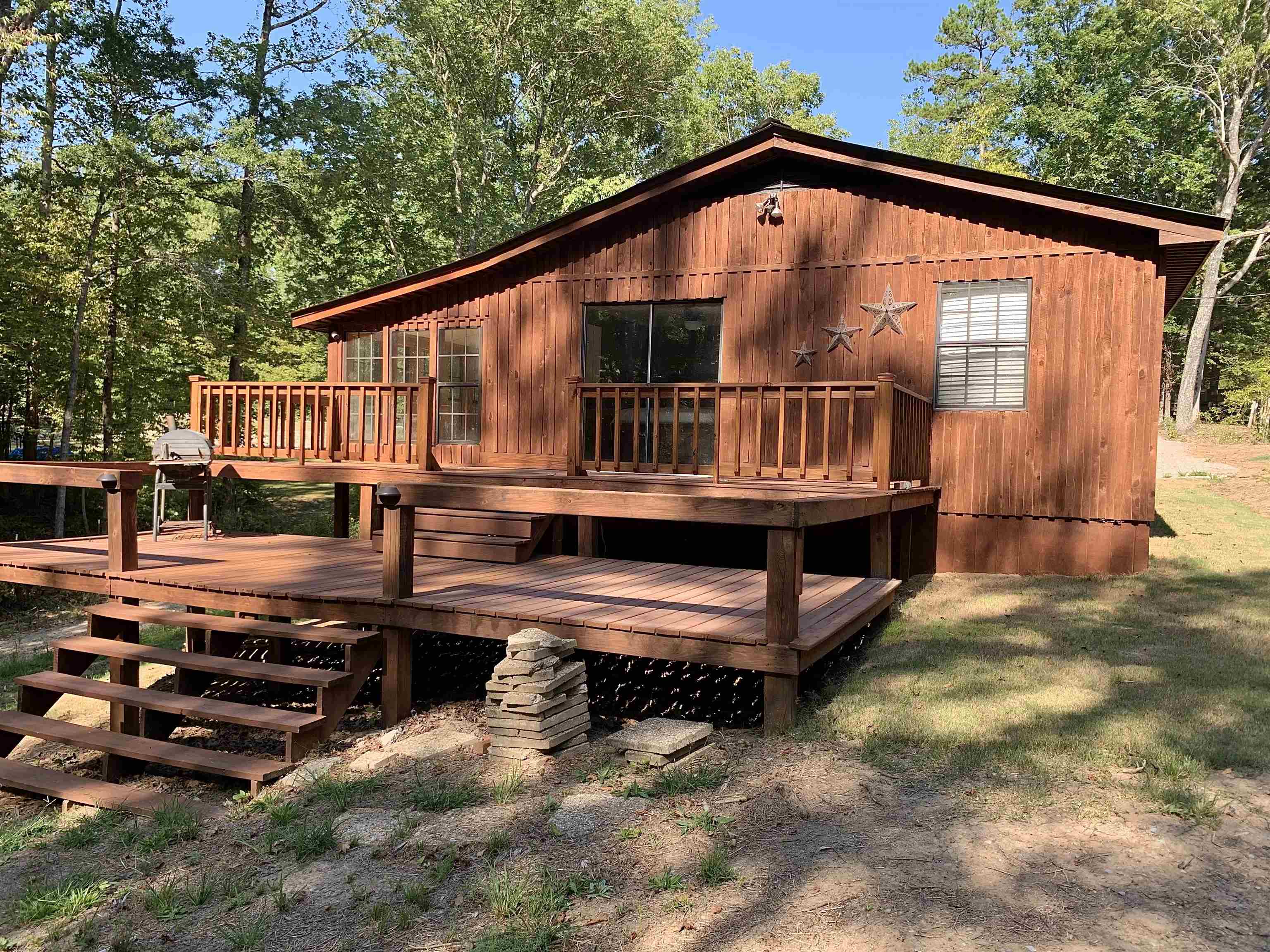 115 Fortune Way Hornsby, TN 38044 - Photo 2 of 30 a backyard of a house with barbeque oven and outdoor seating