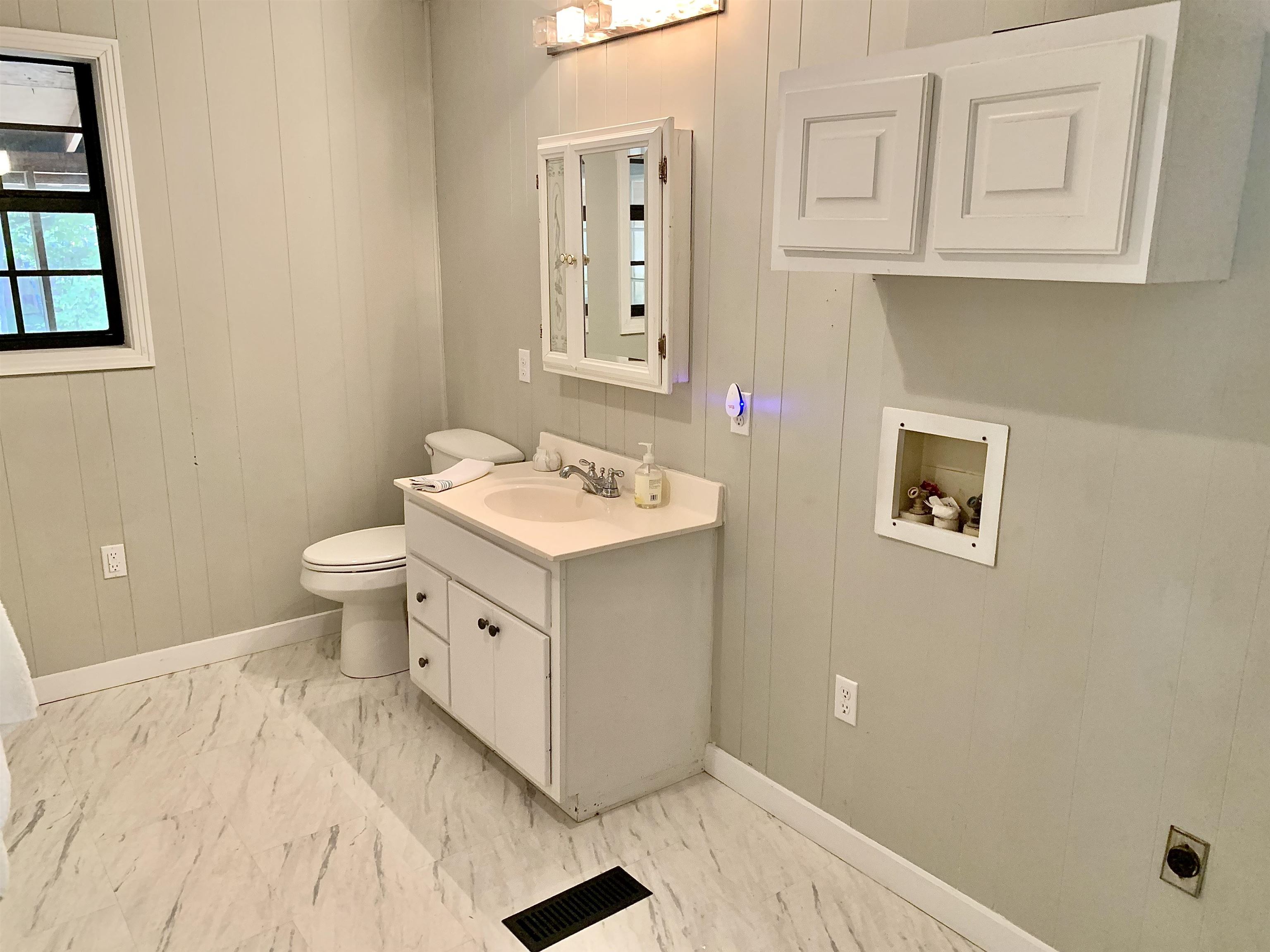 115 Fortune Way Hornsby, TN 38044 - Photo 25 of 30 a bathroom with a sink a toilet and shower