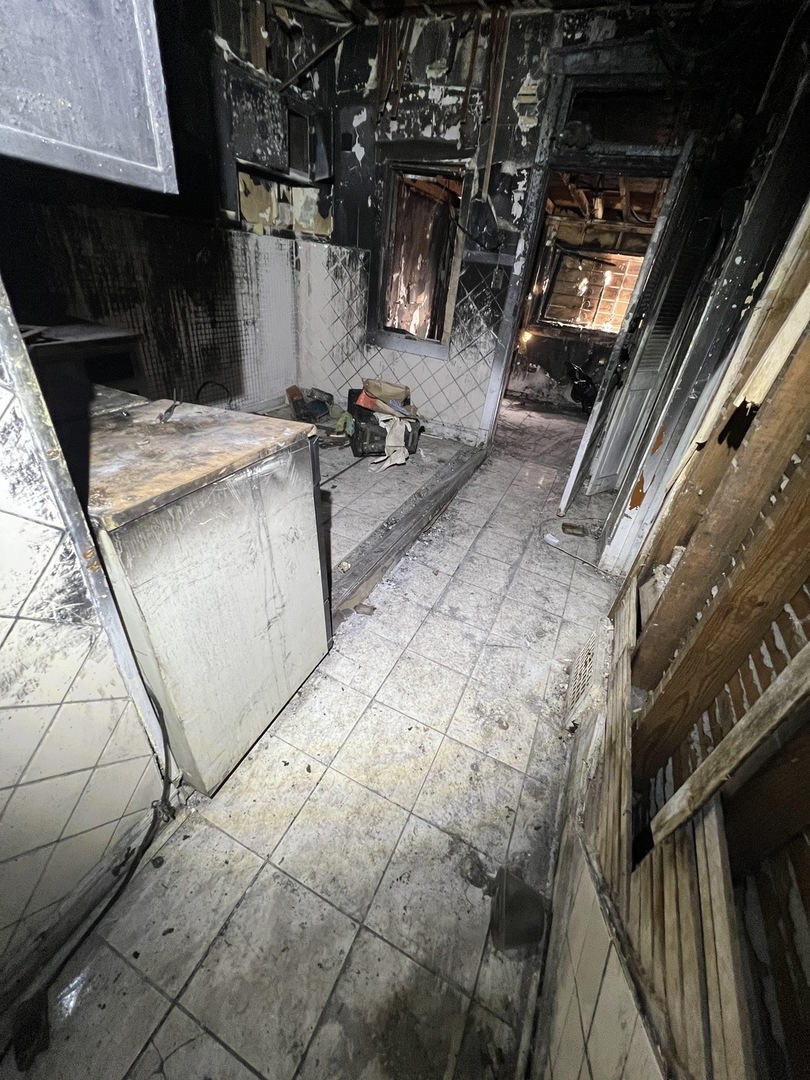 7835 South Rhodes Avenue Chicago, IL 60619 - Photo 11 of 18 a view of storage and utility room