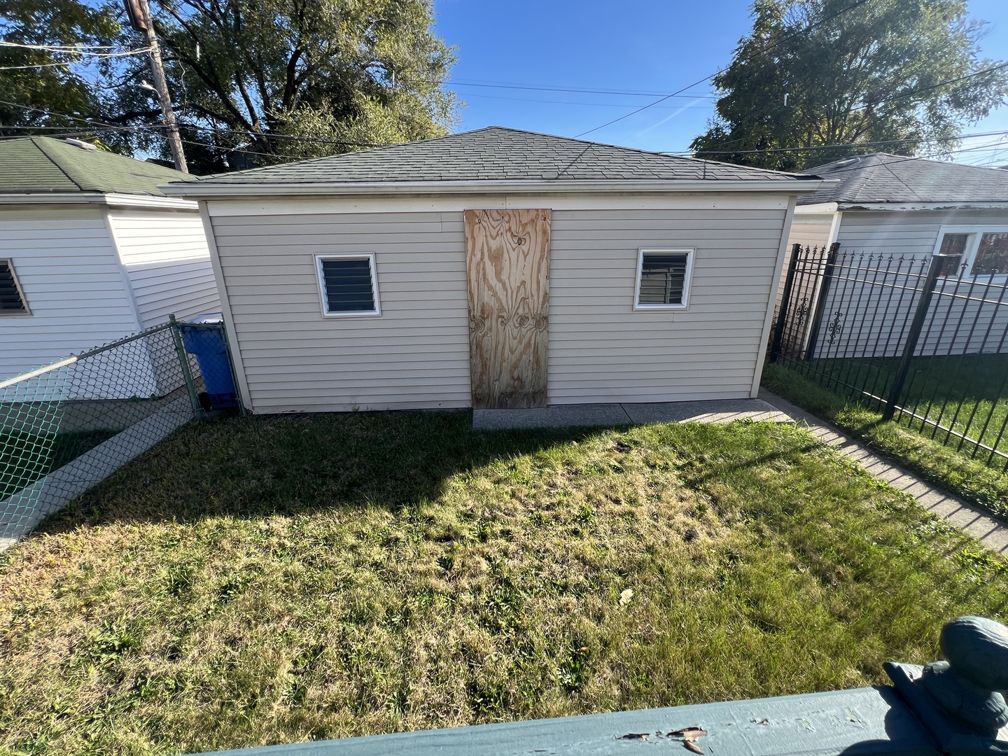 7835 South Rhodes Avenue Chicago, IL 60619 - Photo 16 of 18 a view of a house with a yard