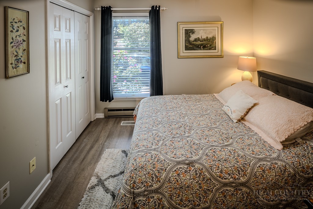 38 Rocky Meadows Road Newland, NC 28657 - Photo 23 of 50 a bedroom with a bed and a window