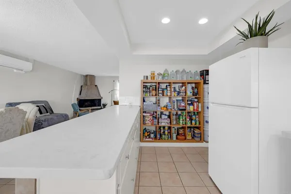 a view of a storage & utility room with washer and dryer