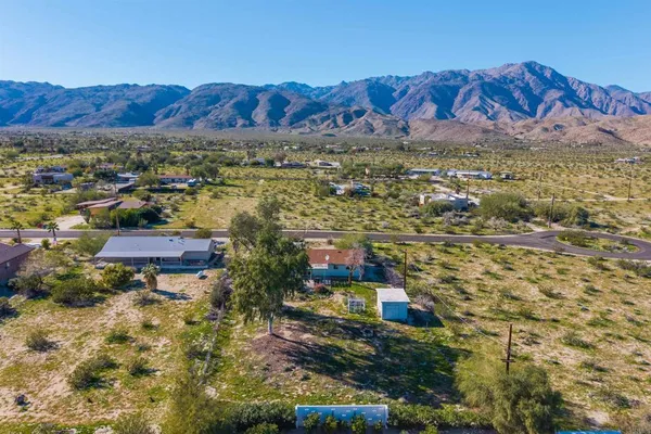 a view of a city with mountain