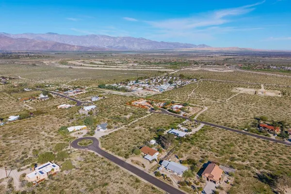a view of a city with an ocean