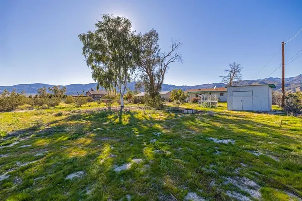a view of an outdoor space and a yard
